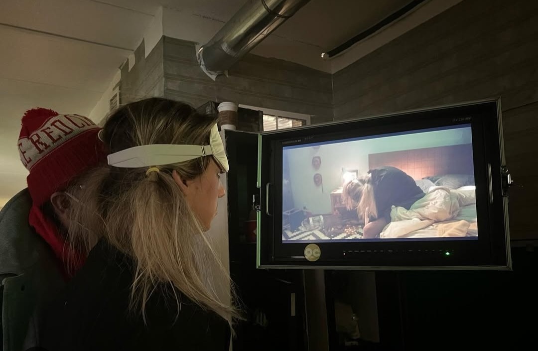 Watching playback at the monitor — Portrait of Consumption.